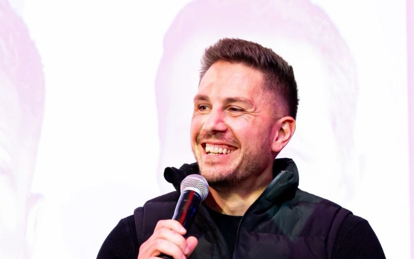 Jandre de Beer, founder of V8 Media, speaking on a panel